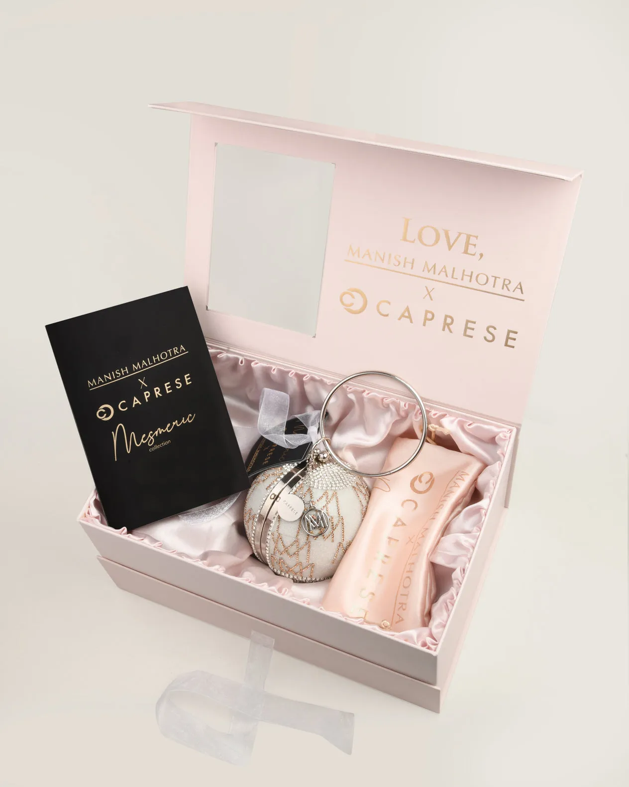 Caprese Enchant Silver Gold Clutch