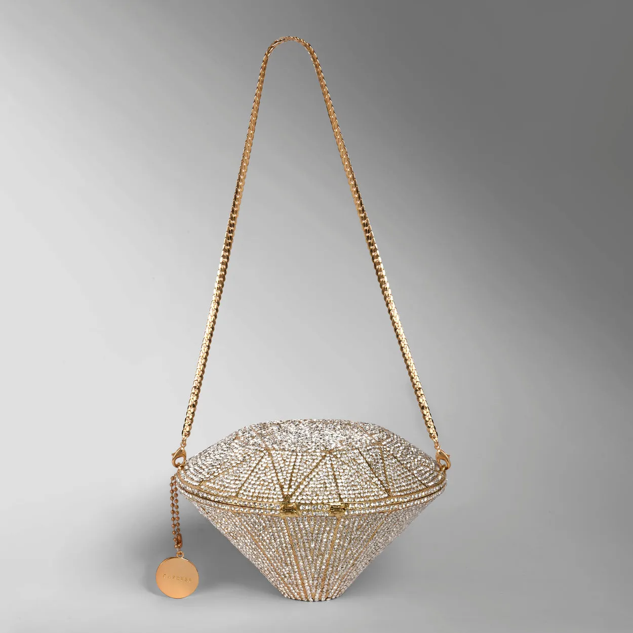 Caprese Enigma Gold Clutch