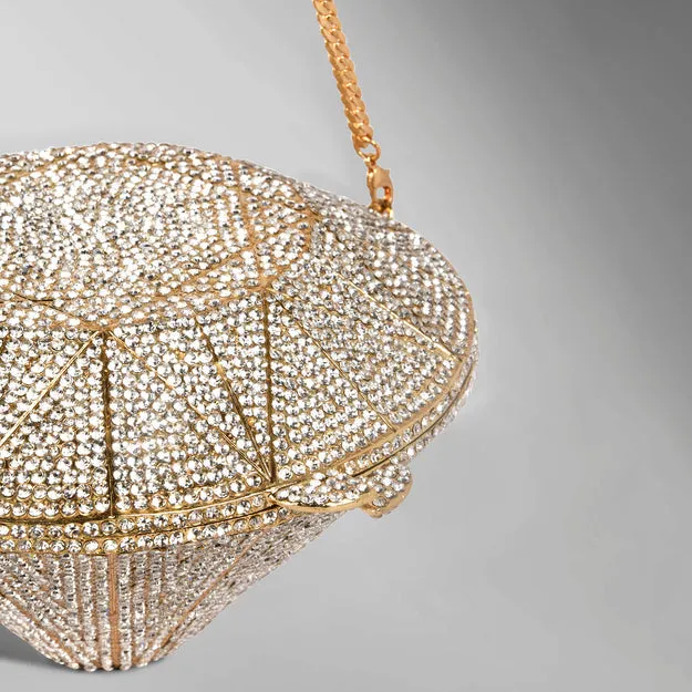 Caprese Enigma Gold Clutch