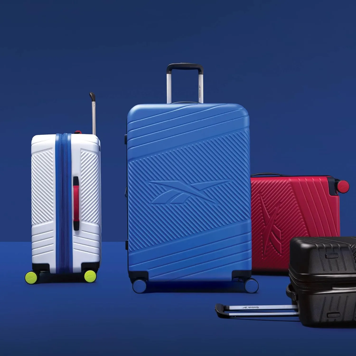 Reebok Go Collection 20 Inch Hard Shell Spinner Carry On Luggage for Airplanes, ABS/PC Hardside Suitcase with 360-Degree Spinner Wheels, Retractable Handle, Airline Approved, Black